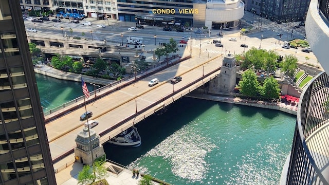 birds eye view of property with a water view