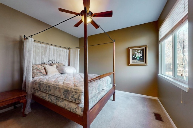 bedroom featuring ceiling fan and carpet flooring