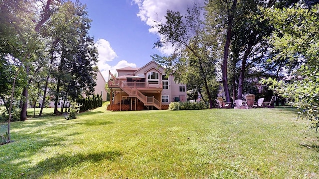 view of yard with a wooden deck