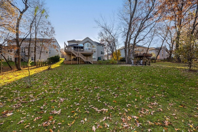 view of yard featuring a wooden deck