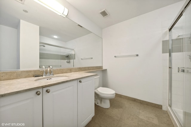 bathroom with walk in shower, toilet, tile patterned floors, and vanity