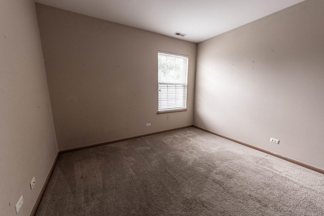 unfurnished room with carpet flooring