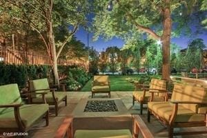 view of patio / terrace featuring an outdoor living space with a fire pit