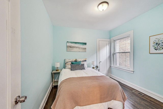 bedroom featuring wood-type flooring