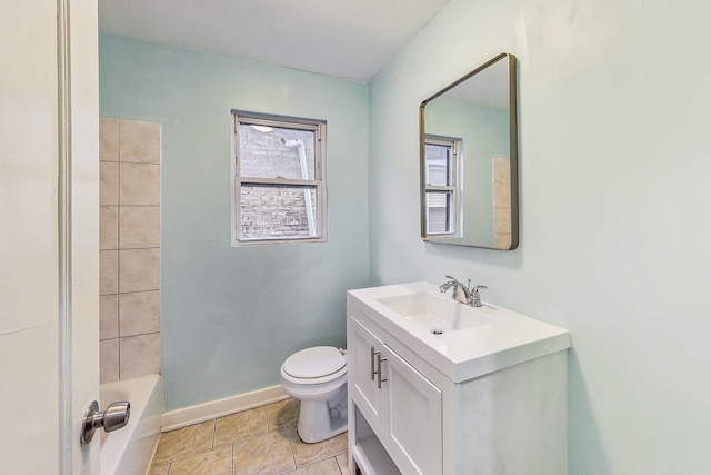 full bathroom with vanity, tiled shower / bath combo, toilet, and tile patterned flooring