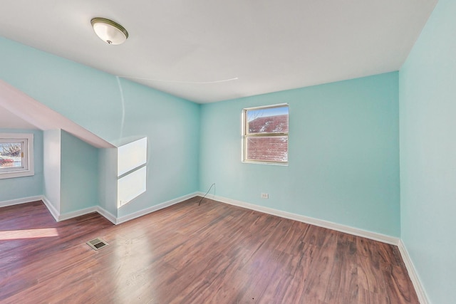 spare room with hardwood / wood-style floors