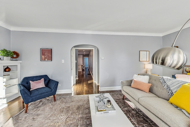 living room featuring hardwood / wood-style flooring and ornamental molding