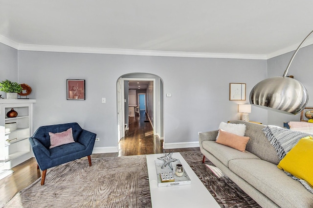 living room with hardwood / wood-style flooring and crown molding