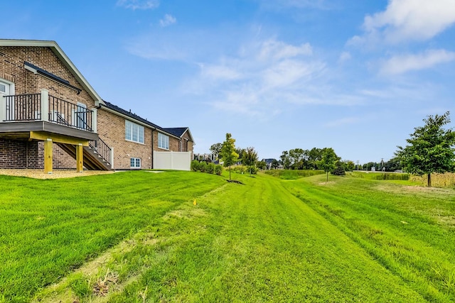 view of yard featuring a deck