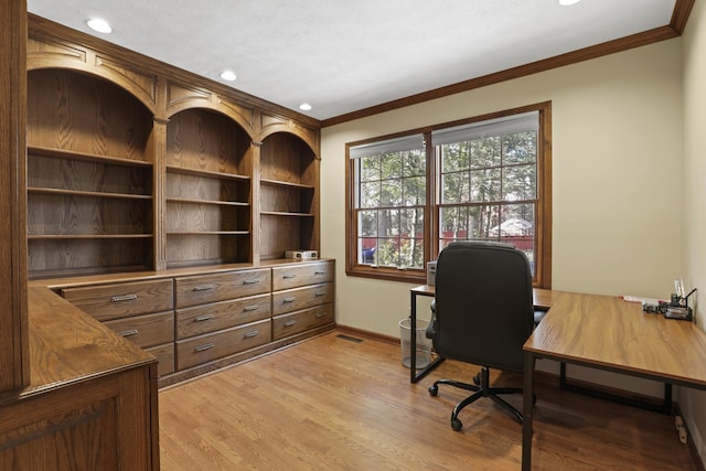 office space with crown molding, light hardwood / wood-style flooring, and a textured ceiling