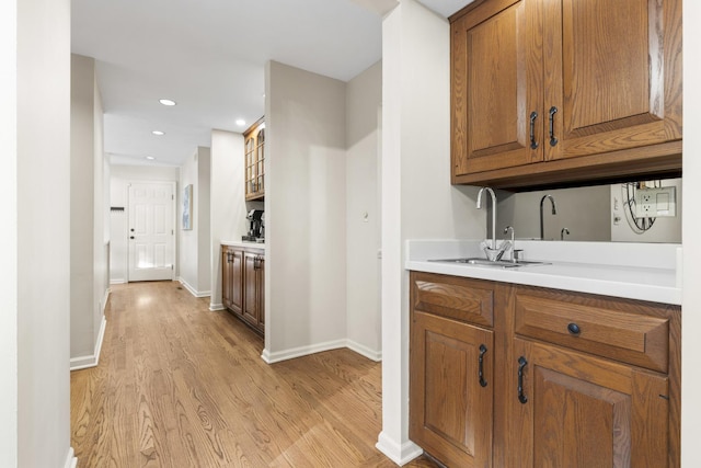 interior space featuring light hardwood / wood-style floors and sink