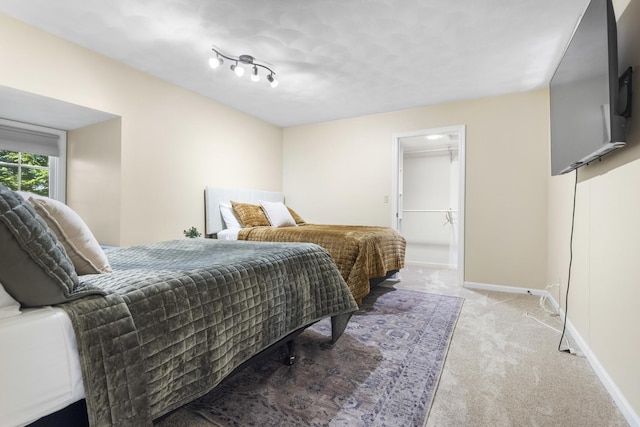 bedroom featuring light carpet