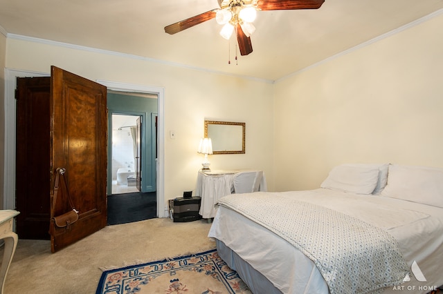 carpeted bedroom featuring ceiling fan and ornamental molding