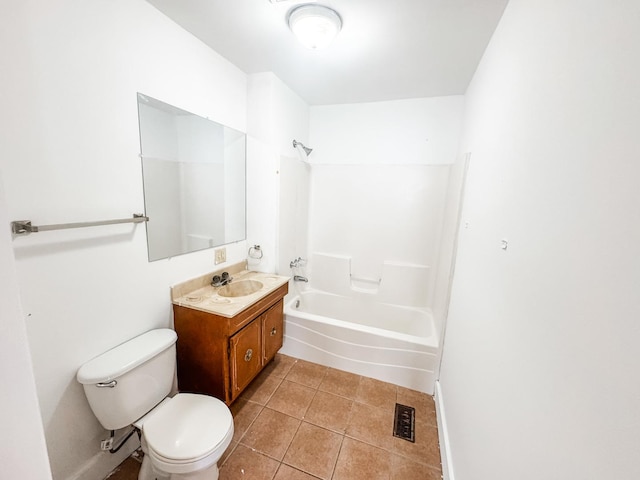 full bathroom with washtub / shower combination, vanity, toilet, and tile patterned flooring