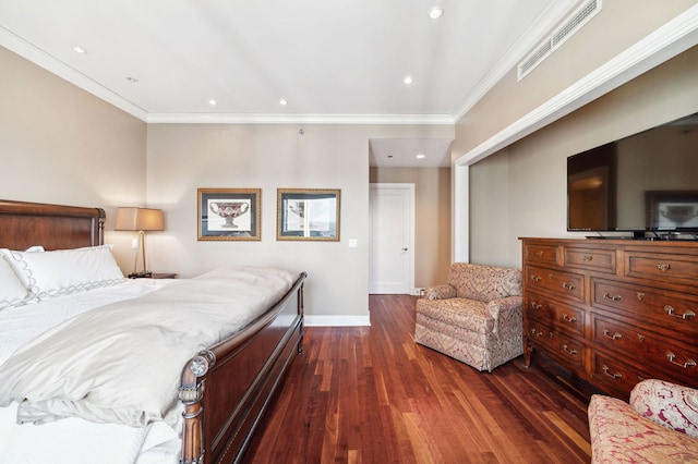 bedroom featuring ornamental molding and dark hardwood / wood-style flooring