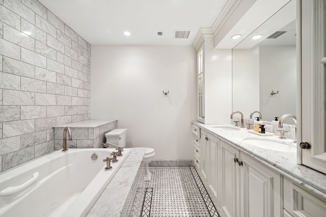 bathroom featuring vanity, toilet, a tub, and tile patterned floors