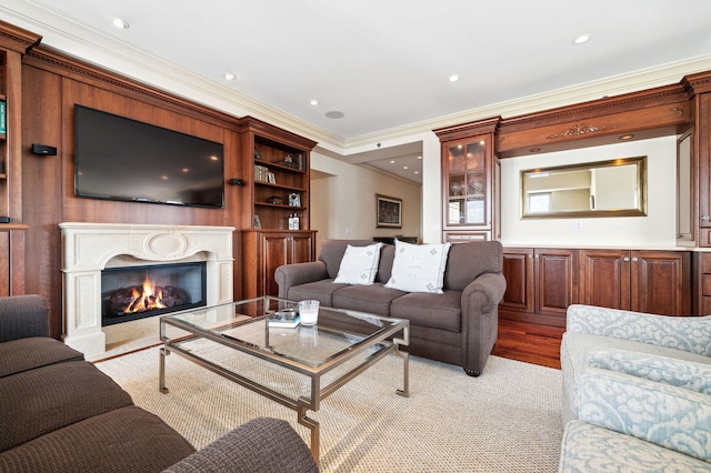 living room with ornamental molding and wood-type flooring