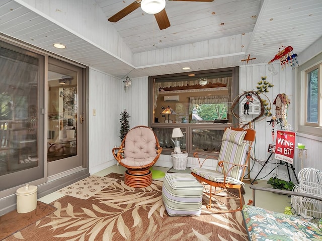 living area with ceiling fan