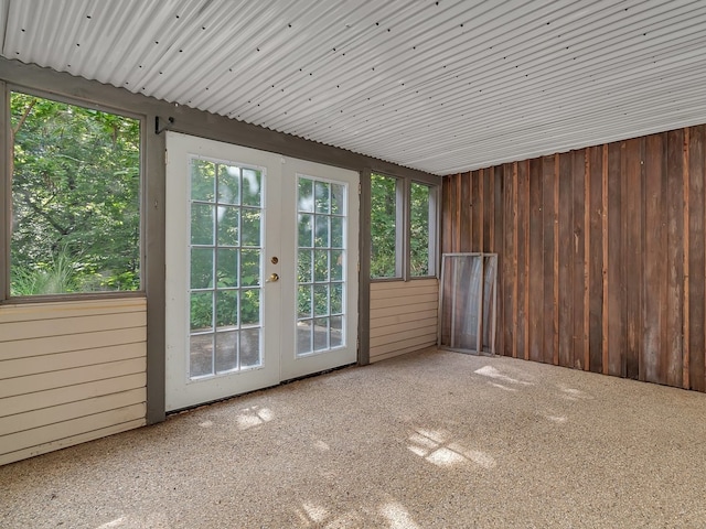 unfurnished sunroom featuring a healthy amount of sunlight