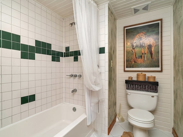 bathroom with toilet, shower / tub combo, and tile patterned flooring