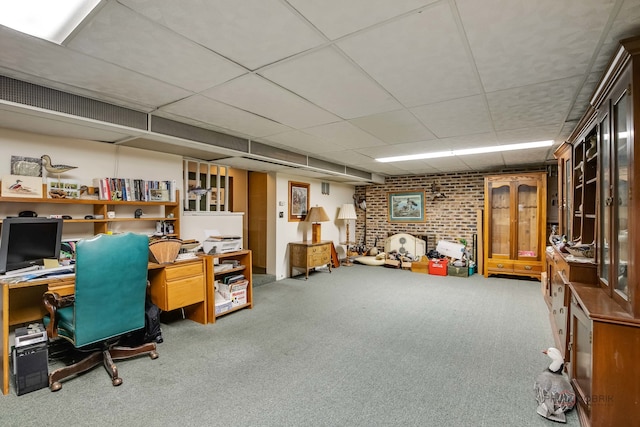 office featuring brick wall and carpet