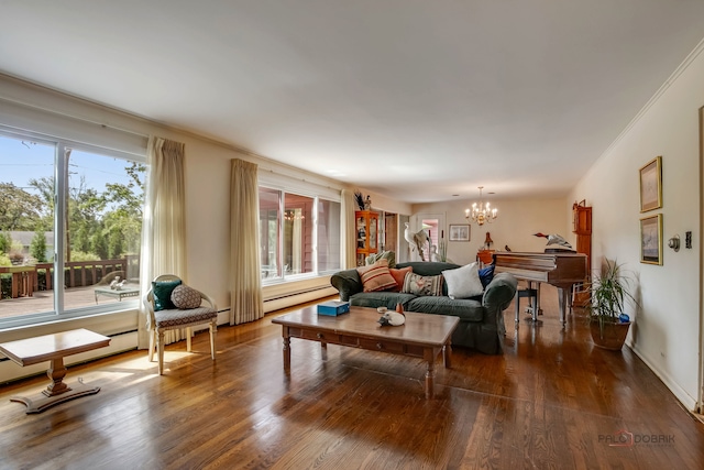 living room featuring plenty of natural light, hardwood / wood-style floors, and a chandelier