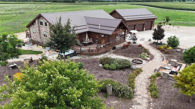 birds eye view of property featuring a rural view