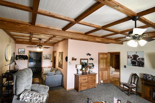 living area featuring baseboards, dark carpet, ceiling fan, beamed ceiling, and coffered ceiling