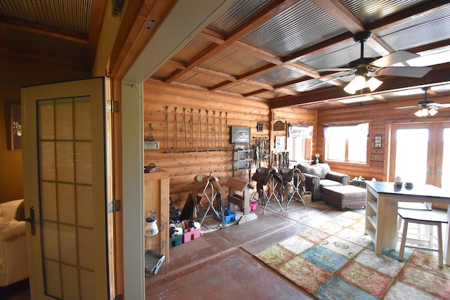 interior space featuring a ceiling fan and beam ceiling