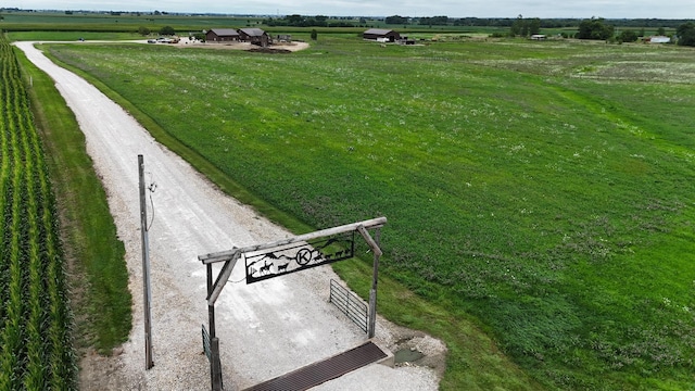 exterior space with a rural view and a lawn