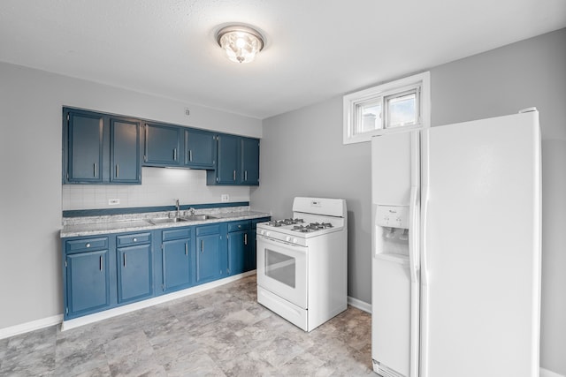 kitchen featuring blue cabinets, light tile patterned floors, white appliances, and sink