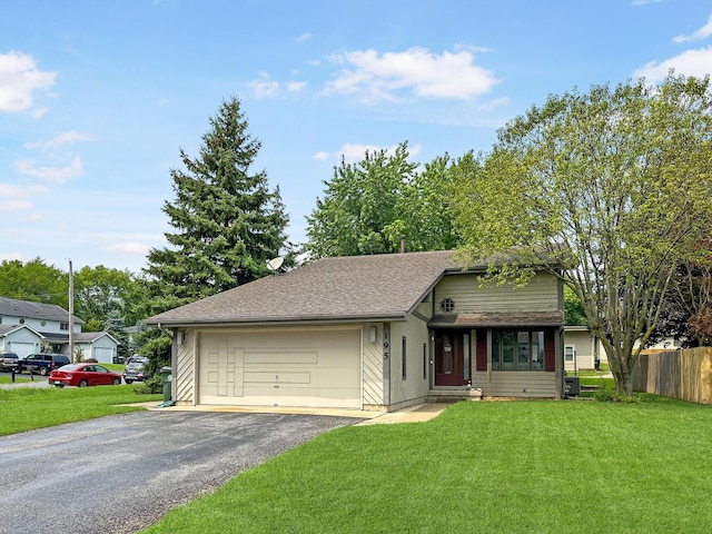 view of front facade featuring aphalt driveway, an attached garage, a front yard, and fence