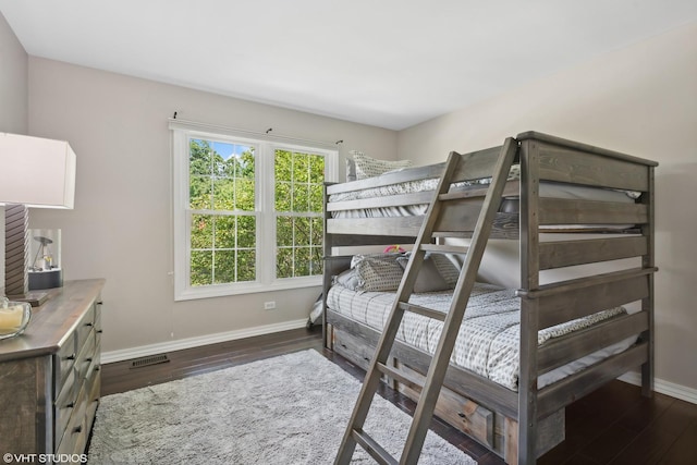 bedroom featuring dark hardwood / wood-style floors