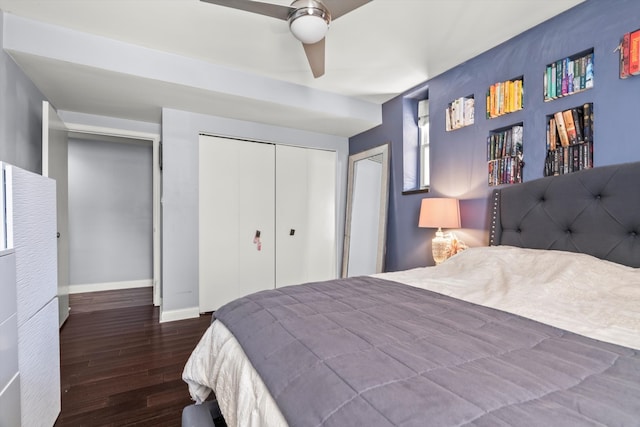 bedroom featuring dark wood-type flooring and ceiling fan