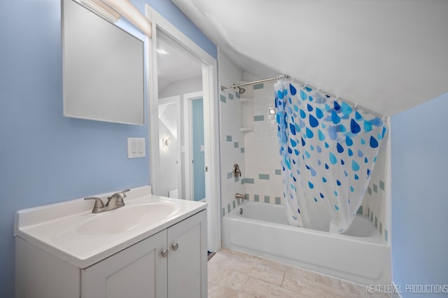 bathroom with tile patterned flooring, shower / tub combo with curtain, and vanity