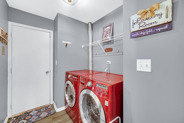 306 Hidden Creek Ln, North Aurora, IL 60542 - laundry room with wood-type flooring and independent washer and dryer