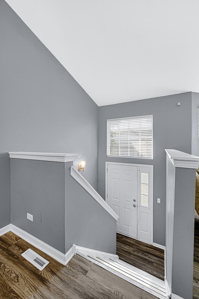306 Hidden Creek Ln, North Aurora, IL 60542 - foyer entrance featuring vaulted ceiling and hardwood / wood-style floors