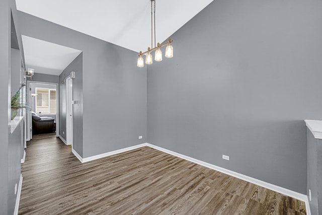 306 Hidden Creek Ln, North Aurora, IL 60542 - interior space featuring hardwood / wood-style flooring, a notable chandelier, and lofted ceiling