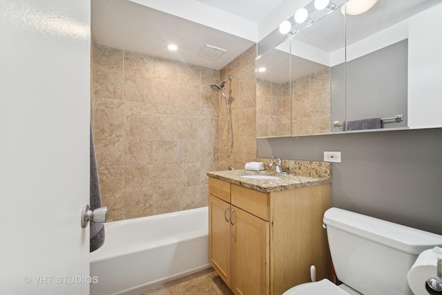 full bathroom with bathtub / shower combination, toilet, and vanity