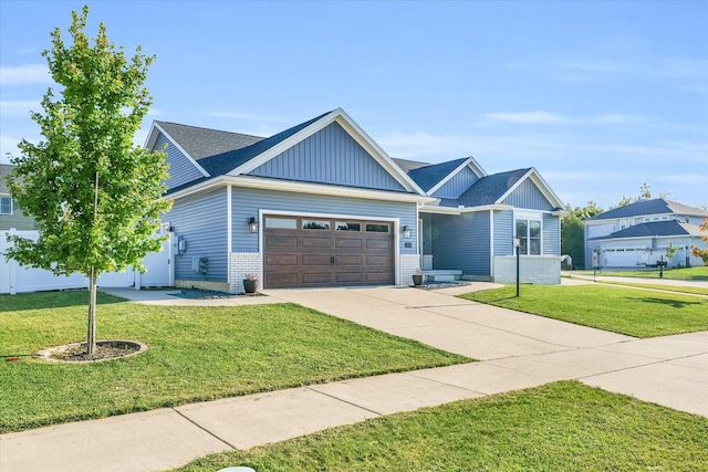 craftsman-style home with a garage and a front lawn