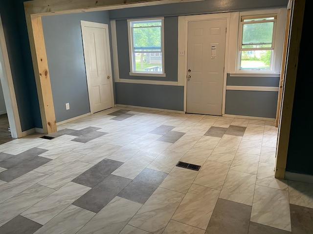 foyer with baseboards