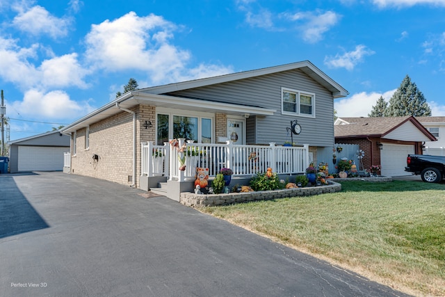 tri-level home with a front yard and covered porch