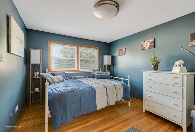 bedroom featuring light wood-type flooring