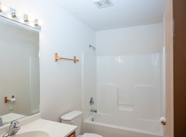 full bathroom featuring vanity, toilet, and shower / washtub combination