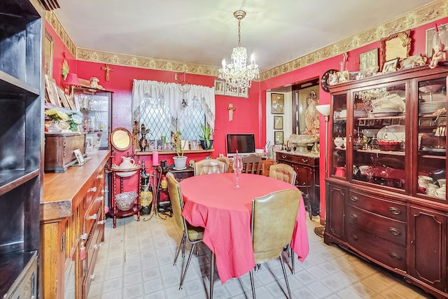 dining room featuring a chandelier