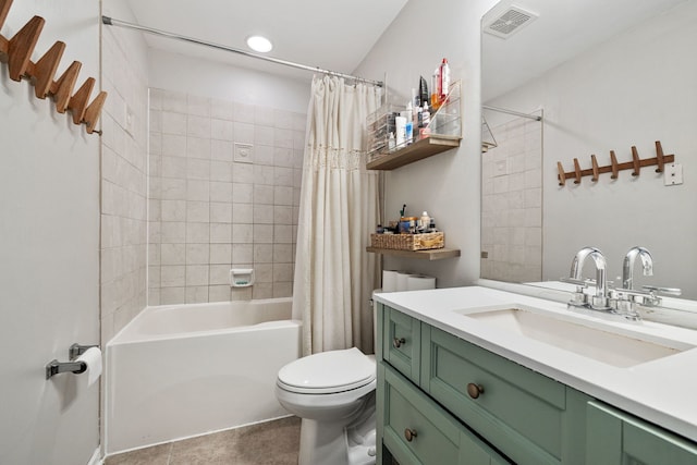 full bath with visible vents, toilet, shower / bath combo with shower curtain, vanity, and tile patterned flooring