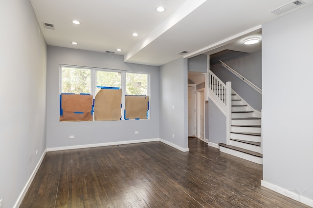 spare room with hardwood / wood-style floors