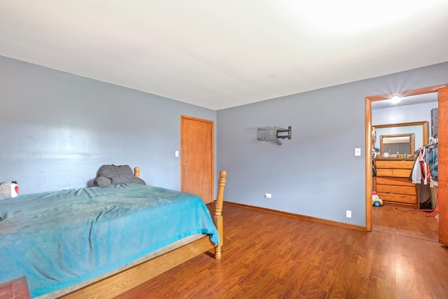 bedroom featuring hardwood / wood-style flooring