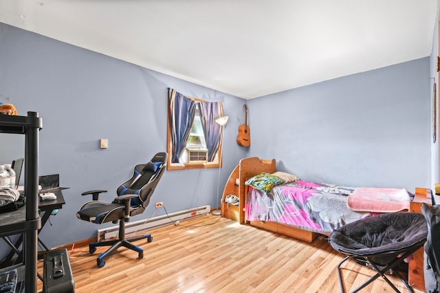 bedroom featuring hardwood / wood-style floors