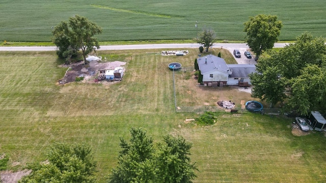 birds eye view of property featuring a rural view